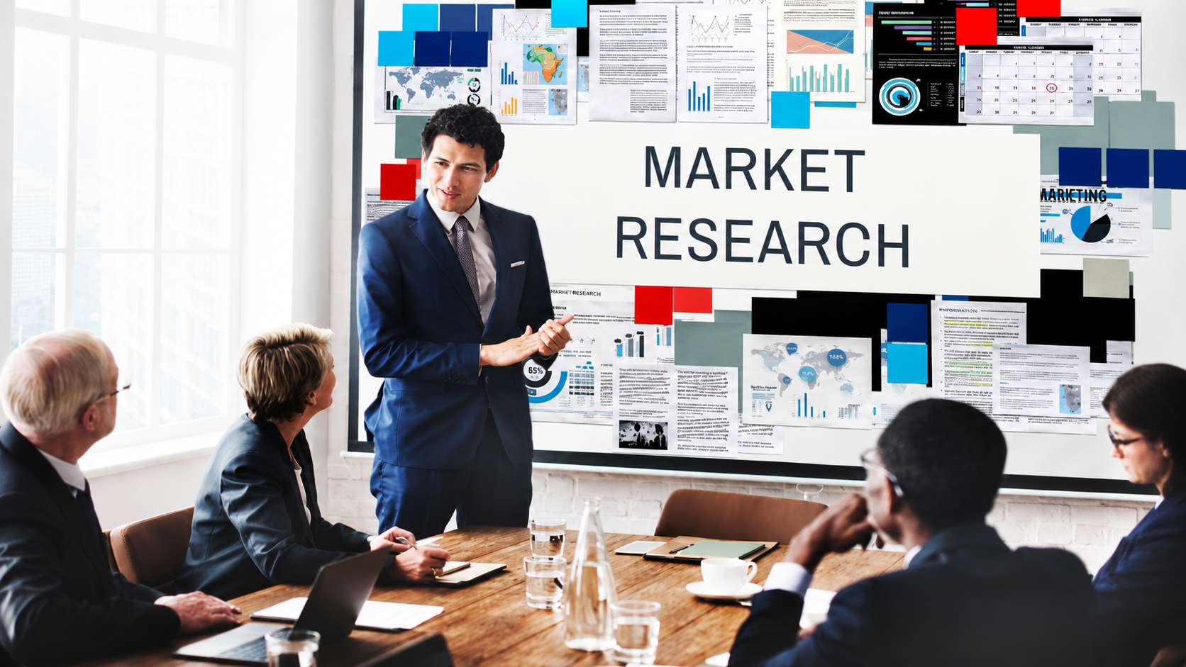 Moyiz Agency Professional business meeting presenting market research data and digital strategy concepts for a Digital Marketing Company San Jacinto, showcasing analytics charts and growth insights on a presentation screen.